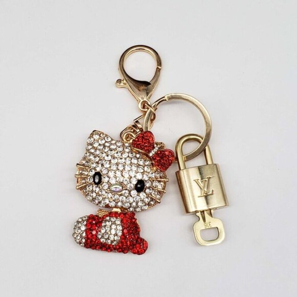 Louis Vuitton Gold Lock 🔒 Authentic LV Key + Unbranded Hello Kitty Bag Charm